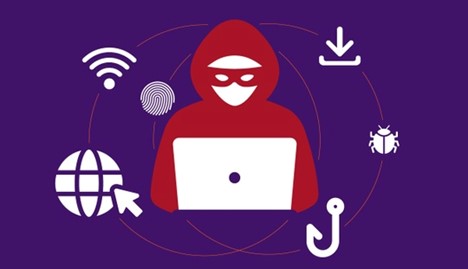 Cyberscammer with laptop