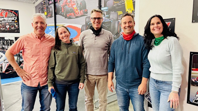 Eagle Wealth Team Members standing at K1 Speed