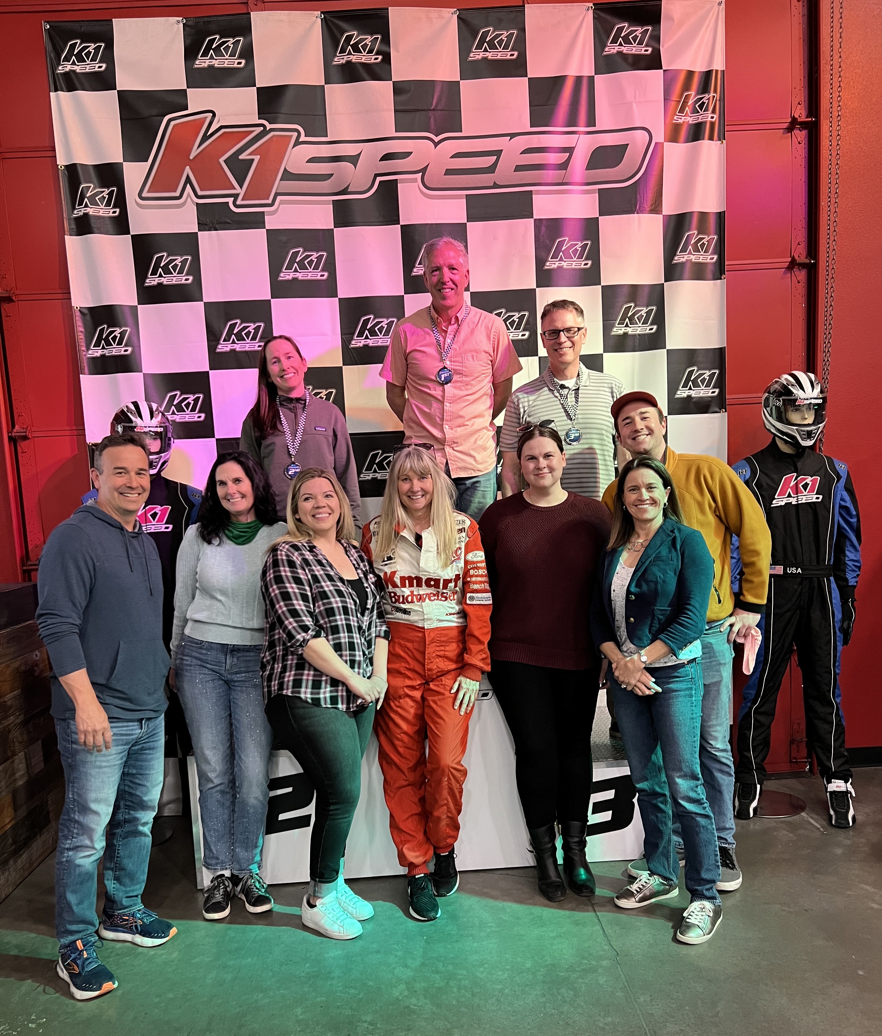 Eagle Wealth Team at racing winner's podium