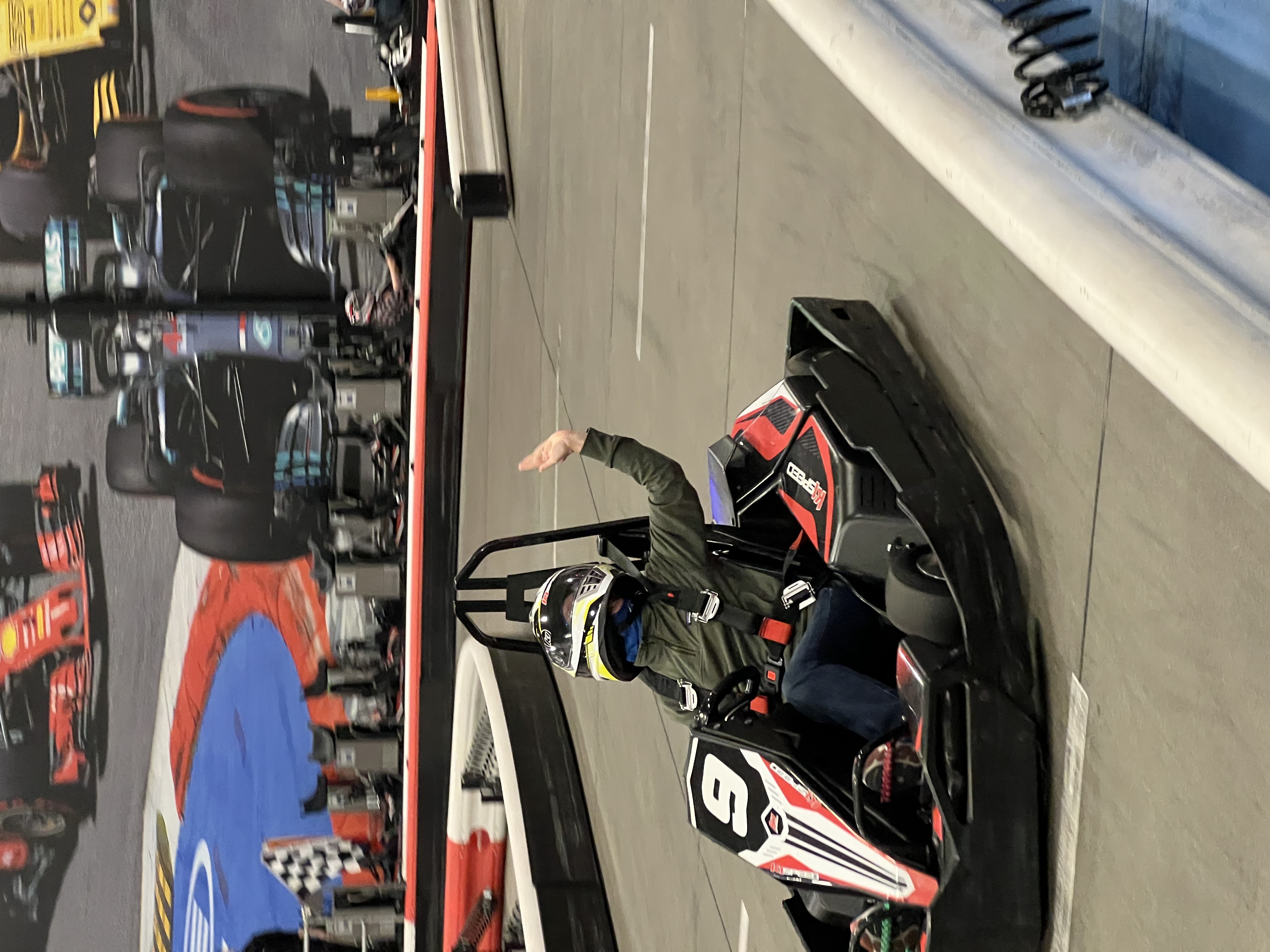Virginia waving in go-kart