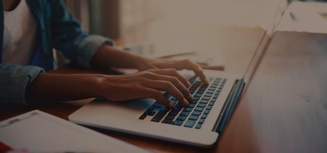 Client typing on computer